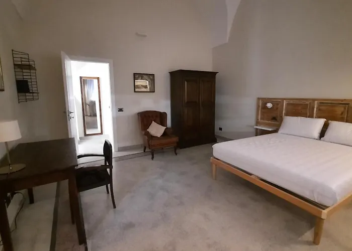 מלון דירות Palazzo Ricciardi לצ'ה